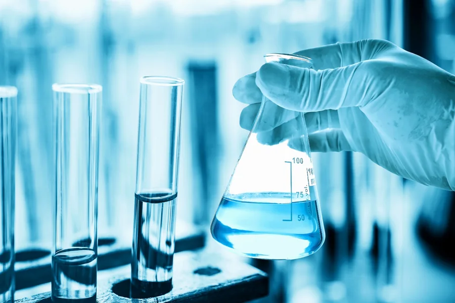 A laboratory flask and test tubes